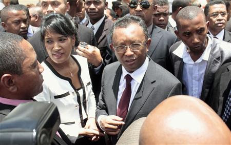 Hery Rajaonarimampianina (C) is congratulated after he was declared Madagascar's president-elect by the electoral court in Antananarivo January 17, 2014. REUTERS/John Friedrich Rabenandro