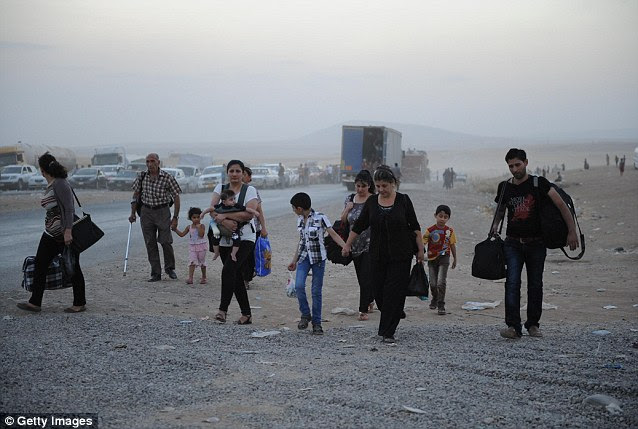 Thousands of Yazidi and Christian people have fled from Mosul to the Kurdish capitol Erbil, also known as Arbil, after the latest wave of advances from Islamic militants that began on Sunday