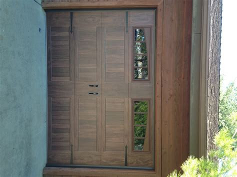 A garage door opener is one of those amenities that provide such tremendous utility that you will wonder how you ever survived without one. CHI Woodtones and Plank Doors - Garage Door Man | Garage