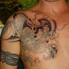 http://upload.wikimedia.org/wikipedia/commons/archive/f/fd/20060621021255!Asian_Dragon_Tattoo_(uncomplete).jpg