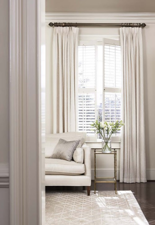 Plantation shutters with curtains