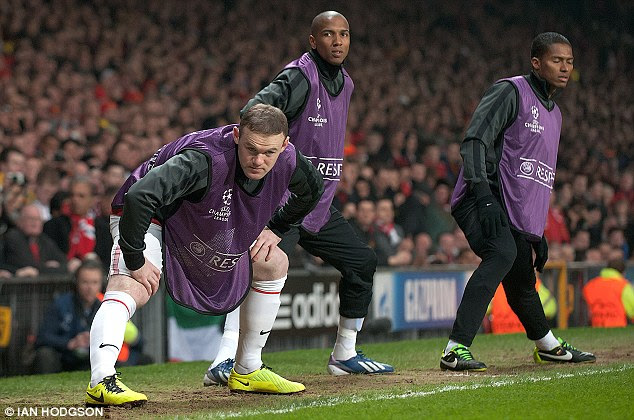 Sidelined: Rooney was sensationally dropped for the match and watched from the bench