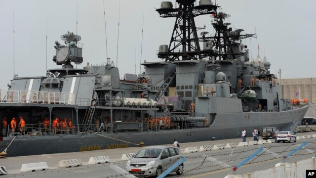 FILE - Russian sailors are seen aboard the Admiral Panteleyev Russian warship moored at the Mediterranean port of Limassol, Cyprus, May 17, 2013.