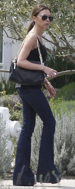Dressed down: Victoria took time out from her haute couture collection for something a little simpler