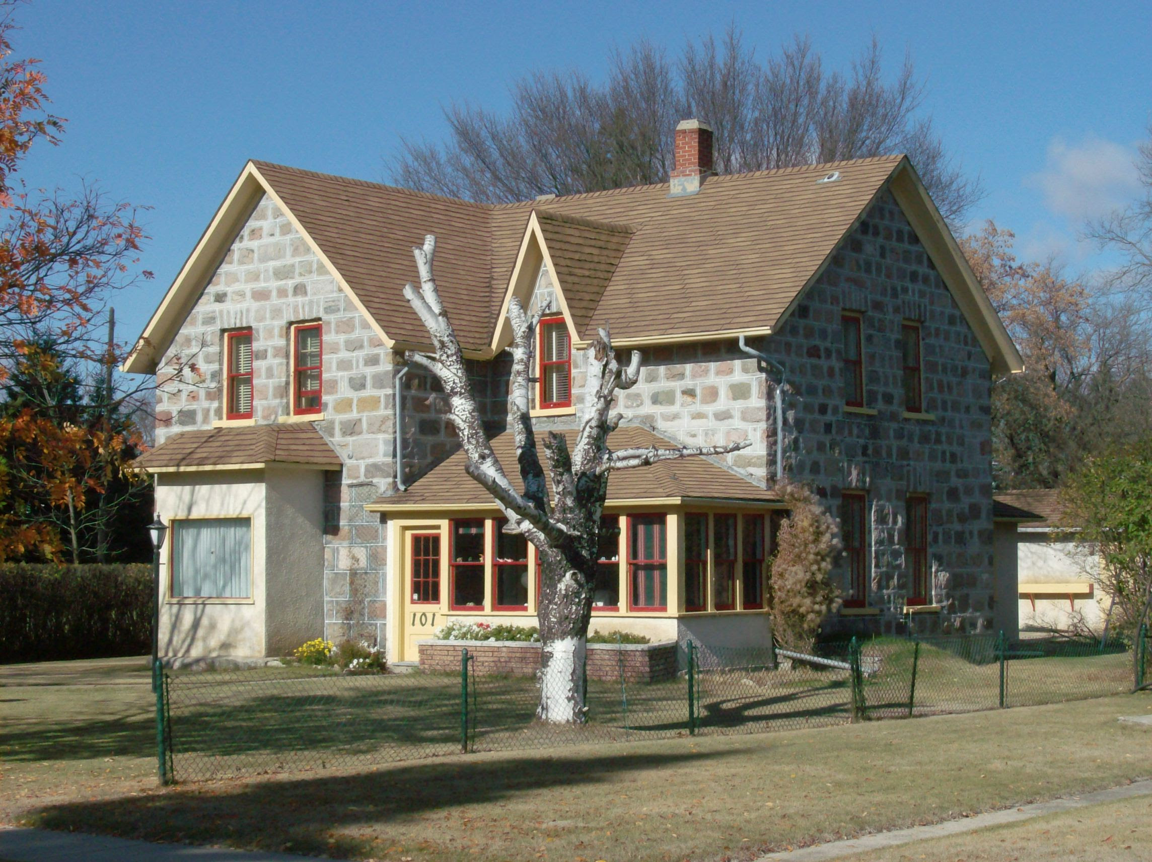 Typical of the style is the steep gable paired with a more relaxed ...