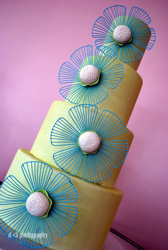Blue and green striking floral tiered cake from Sugar