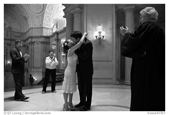 black and white kissing photography. Just married couple kissing