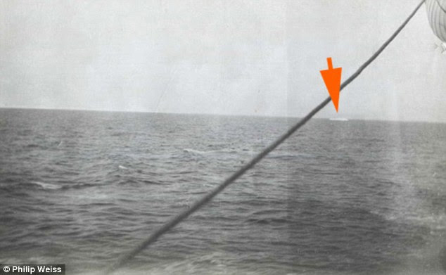 Danger ahead: Taken from a rescue vessel, this photograph shows an iceberg in the distance - perhaps even the one that sank the luxury liner
