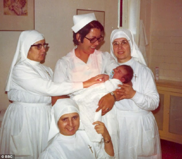 Stolen: Thousands of babies were supposedly stolen from Spanish hospitals by a group of nuns, doctors and other officials, such as this baby boy in the arms of his new mother surrounded by the nuns who sold him in Malaga in 1971