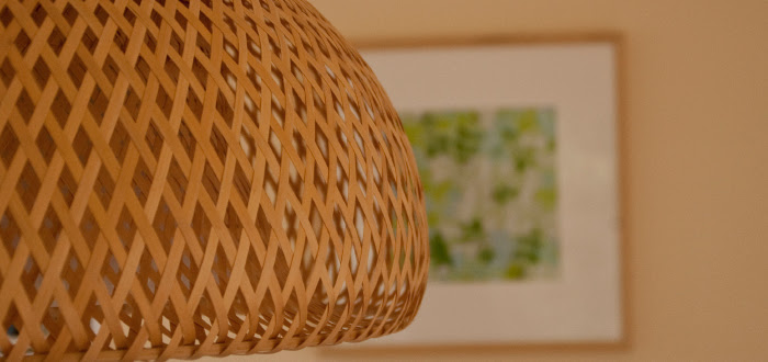 dash dot dotty dashdotdotty house tour interiors tan comfortable modern dining room ikea chadelier wicker print framed wrapping paper