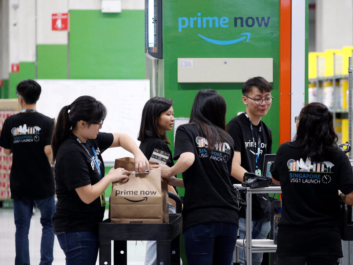 Employees work at Amazon's Prime Now fulfillment centre in Singapore July 27, 2017. REUTERS/Edgar Su