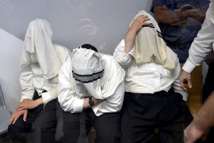 Six teachers of an ultra-Orthodox school in Tel Aviv are brought to a court hearing at the Tel Aviv district court on August 2, 2016, The six teachers accused of physical abuse of pupils, and one of them in sexual abuse. Photo Roy Alima/Flash90 
