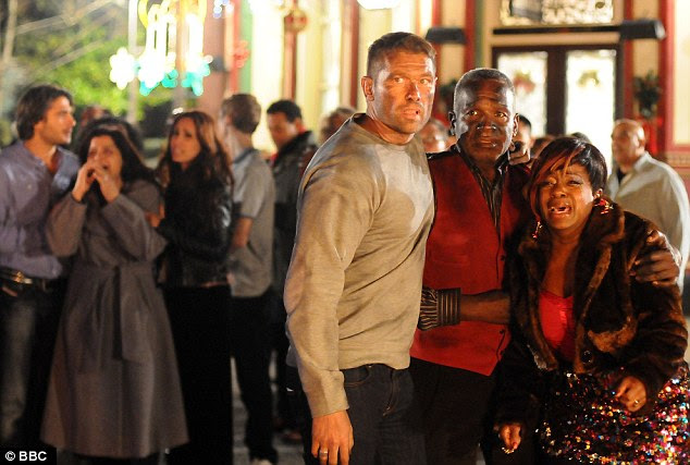 Fireworks: Christian, Patrick (Rudolph Walker) and Kim (Tameka Empson) watch as the B&B explodes 