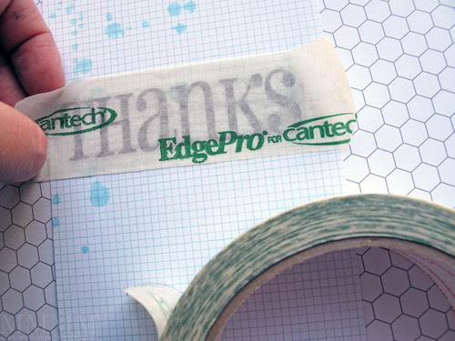 3 You could sand the sticker before you add it to your project to reduce the chance of smudges but I just stuck a piece of low tack painters tape on and