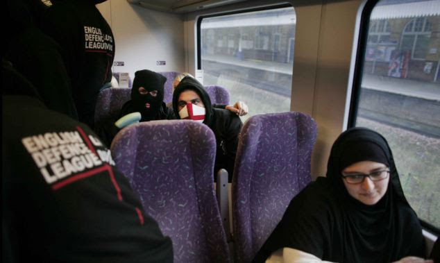 English Defence League protest march en route by train to Manchester from Bolton