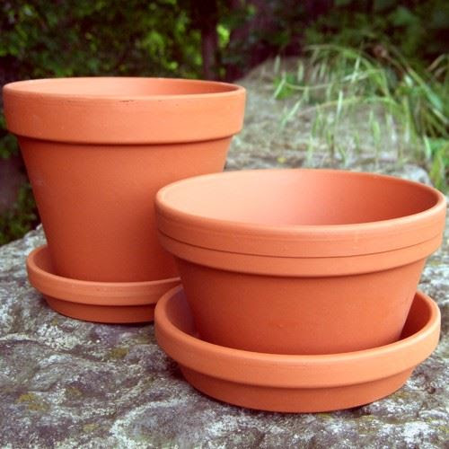 Half Flower Pot saucers 13cm x 7 5cm Terracotta uk Half Flower Pot saucers 13cm x 7 5cm Terracotta uk