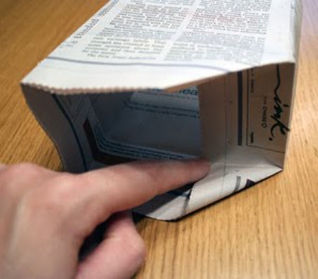 Paso 41 Hacer bolsas de regalo con papel periódico