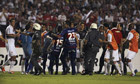 Sao Paulo and Tigre players argue after the first half of their Copa Sudamericana second-leg final