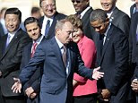 Jovial: There may have been a cull in smiles after Putin admitted to helping arm Syria