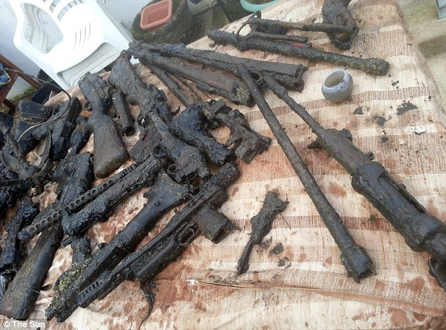 A teenage metal detector discovered 40 weapons dumped in the Somerset Levels when trawling the water with a magnet. Some of the guns may have belonged to members of the IRA, experts said
