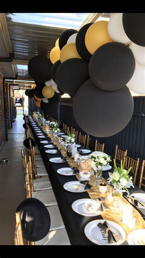 Registration on or use of this site constitutes acceptance of our terms of servic. 50th long table setting! Black, gold and white. | Birthday