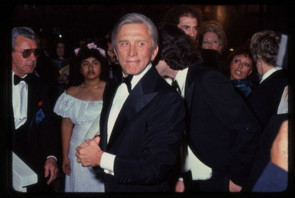 Confidence: Here, Kirk Douglas displays the machismo of a true Hollywood patriarch. Cumming writes that his main interest as a photographer living in the Golden State was anything 'peculiar to California.' This includes Hollywood, of course