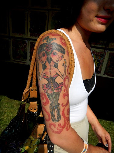 Bikinis Virgin Tattoos on Woman Arm 