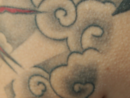 tattoo · clouds · grey. Show machine tags (0) Hide machine tags (0)