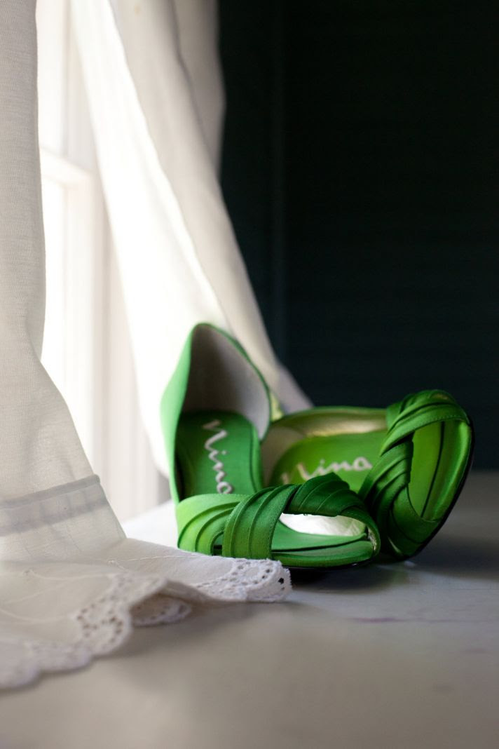 Chic green satin peeptoe bridal heels and ivory lace wedding dress