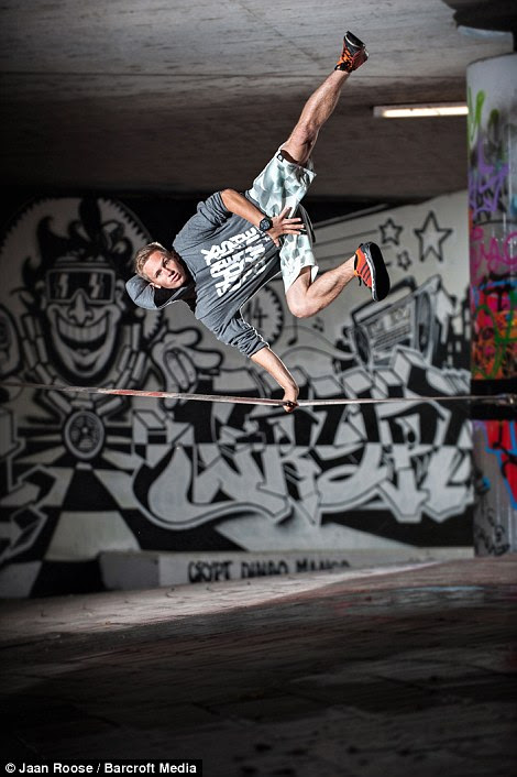 *** VIDEO AVAILABLE ***  *** PLEASE NOTE: Video available to embed at: http://ift.tt/1wzhG83 ***  STUTTGART, GERMANY - JULY 2014: Slackliner Jaan Roose performing and posing for the camera on July, 2014 in Stuttgart, Germany.  NOT content with backflips or somersaults, this experienced slackliner STRIPS in mid-air. While balancing on the rope the talented adventurer rips off his shirt and pulls down his trousers to reveal his chiselled abs ñ and underwear. Jaan Roose, 22, from Estonia, has been a slackliner for four years - shooting videos around the world. The sport requires intense concentration to remain balanced on an unstable line that is anchored between two points.  PHOTOGRAPH BY Jaan Roose / Barcroft Media  UK Office, London.  T +44 845 370 2233  W http://ift.tt/ywbXUk  USA Office, New York City.  T +1 212 796 2458  W www.barcroftusa.com  Indian Office, Delhi.  T +91 11 4053 2429  W http://ift.tt/1fsp4p6
