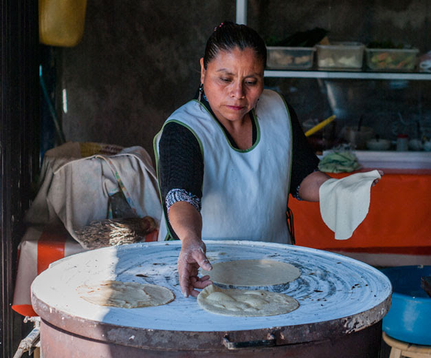 A tortilla vendor in Oaxaca, photo by Ben Herrera