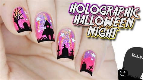 pink holographic haunted house nails halloween nail art