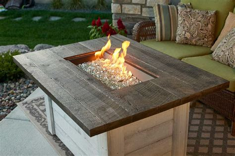 Fire pits can be used to cook food, provide warmth and to roast marshmallows. The Outdoor Greatroom Company Alcott Rectangular Gas Fire