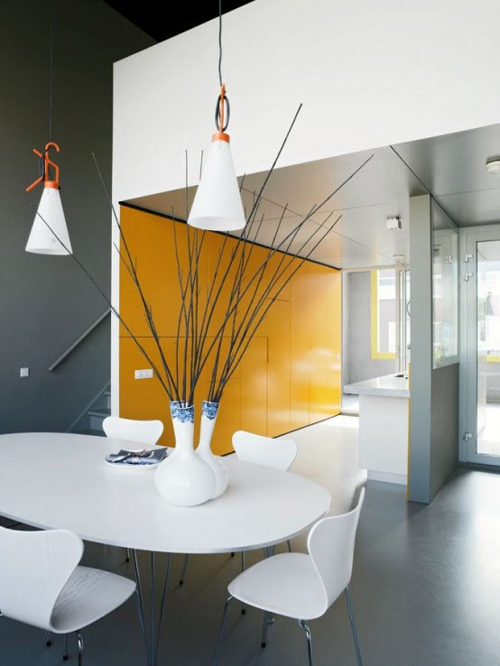 One of cool home painting idea, S-House is one of the islands and was designed by Architect IJburg vmx. In the design combined two classic typologies: the villa terrace and the manor house, or domus. Horizontal house has been divided into three parts. The ground floor is designed as a basement, with entrance to the house, storage space, and a great drama and a hobby room adjoining garden. Terrace with a kitchen is an open space on the first floor. Sitting room, or lounge with views of gardens and paths, located above the kitchen. Upstairs is reserved for the bedroom and bathroom. The front of the S-tile house wrapped in a clear bright yellow house set apart from all the other houses on the same line. As quoted by Home Model Ideas from DigsDigs (Thursday, April 19, 2012).