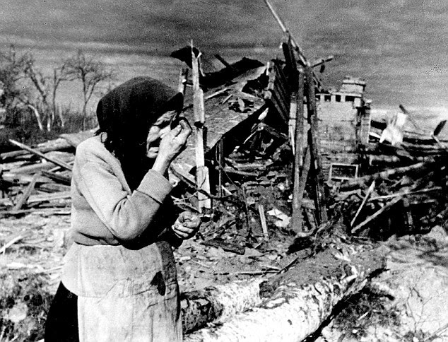 Under siege: Suffering after a bombing raid in the encircled city of Leningrad