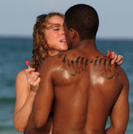  Roman numeral '4′ tattooed 