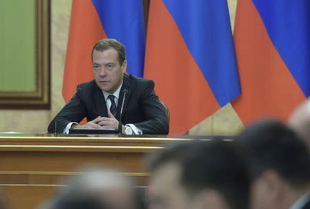 Russian PM Medvedev chairs a meeting with government members and other officials in Moscow