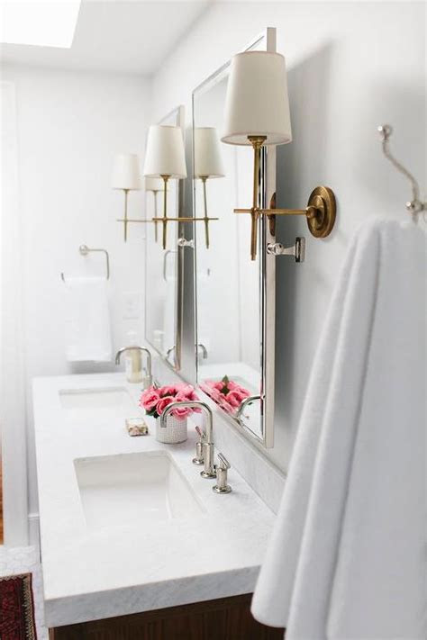 Shop for vanity lights & bathroom light fixtures in wall lights & fixtures. Nickel Bathroom Mirrors with Antique Brass Sconces