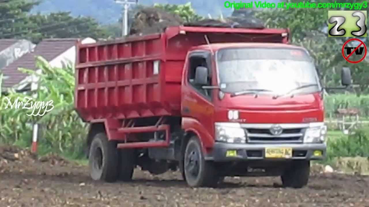 Toyota Dyna Dump Truck Unloading Dirt 
