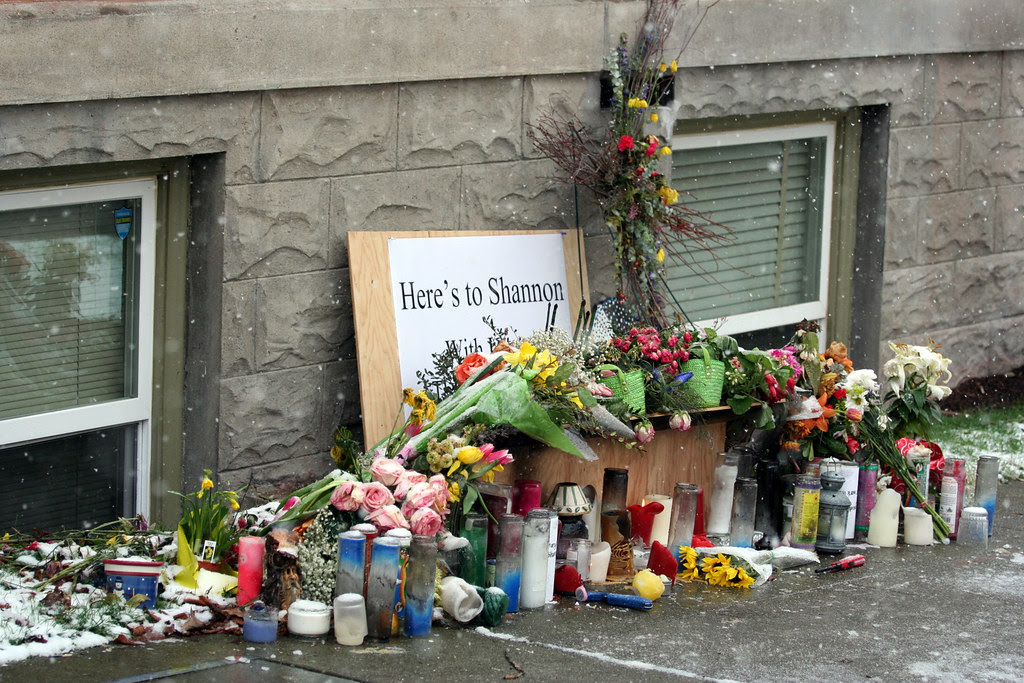 Candles and Flowers in the Falling Snow