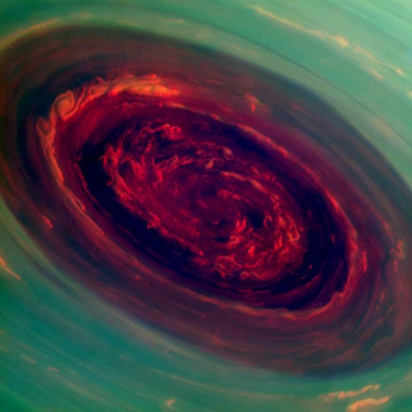 A false-color image, taken by the Cassini spacecraft, of a huge hurricane at Saturn's north pole. Credit: NASA/JPL-Caltech/SSI