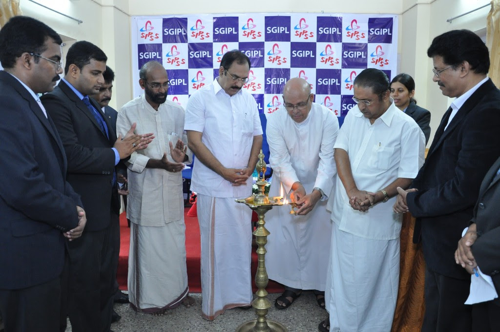 SIPSS GLOBAL INDIA PVT LTD Thrissur Regional Office inauguration function -    Lighting the Lamp by V. REV. Fr. Davis Pulikottil (Forane Vicar of Shrine Baslica of Our Lady of Dolours Church Thrissur)