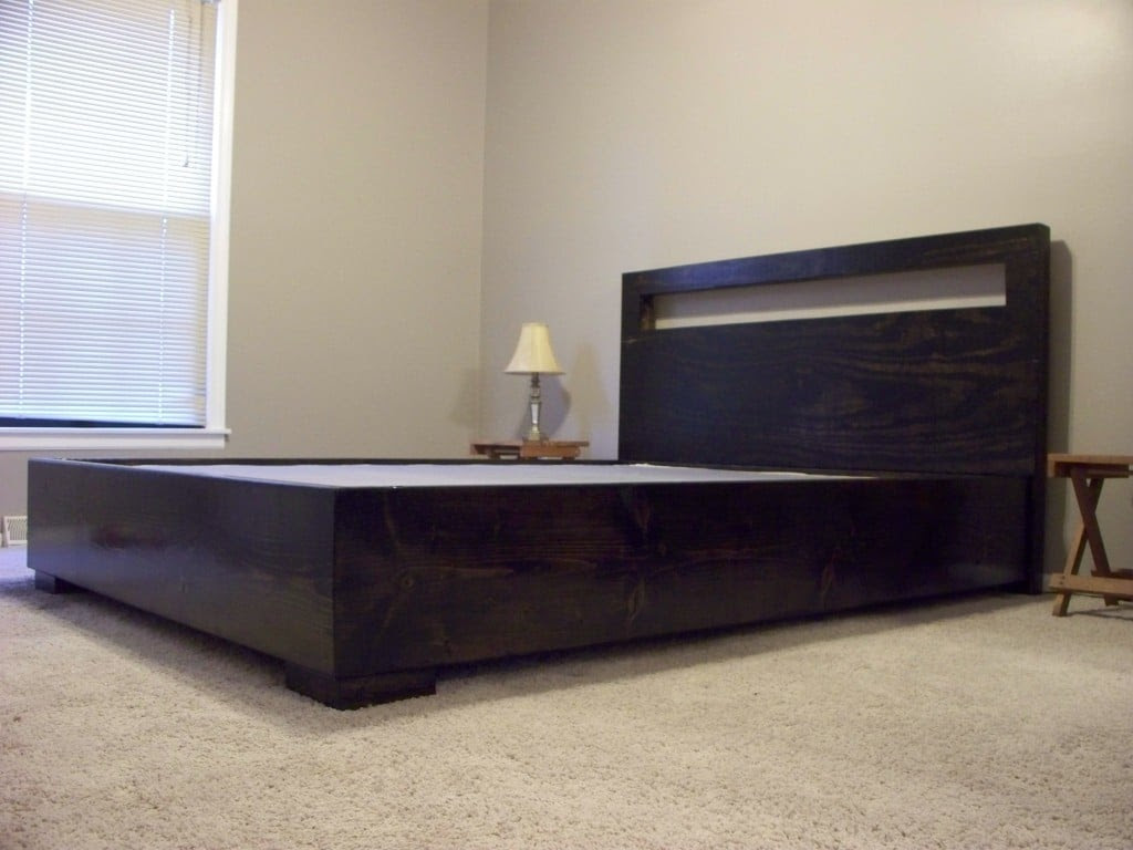 simple low headboard with a cutout that works with a platform bed
