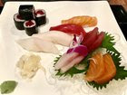 [I ate] Tuna, salmon and yellowtail sashimi with tuna roll.