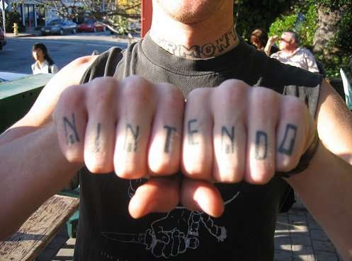 Here are some of the better looking Nintendo art logo tattoos, besides the 