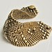 Liquid Gold Mesh Rock