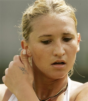 Tattoo Watch continues with this photo of the Frenchwoman during her loss to 