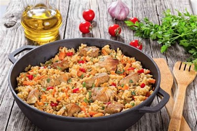 Paella De Carne: A Traditional Spanish Dish With Meat