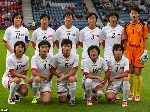 The North Korean women's soccer team poses for a photograph before the group B match between Colombia and North Korea
