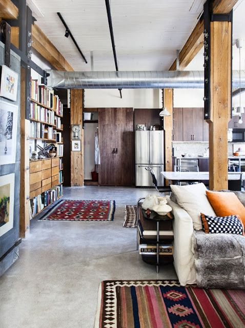 patterned rugs and rustic wooden beams